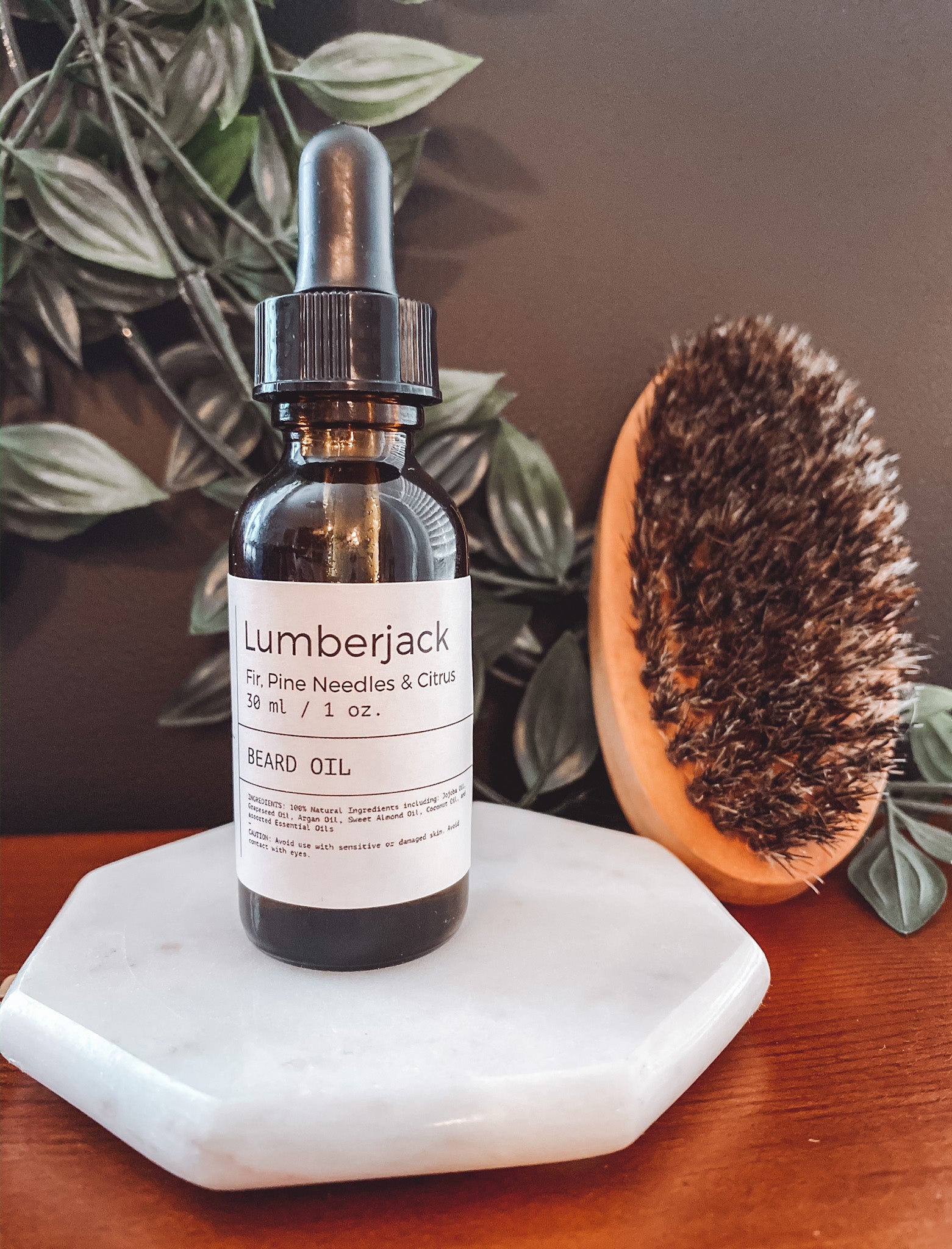 A bottle of Lumberjack Beard Oil with a rustic design, featuring natural ingredients and a rugged scent profile.