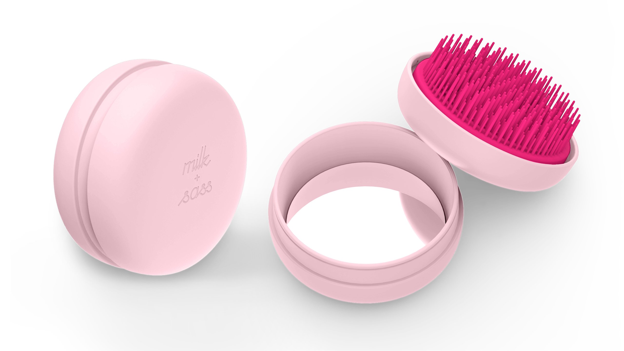 A stylish macaron for hair® travel hairbrush with a pop-off cover and integrated mirror, designed for easy detangling and portability.