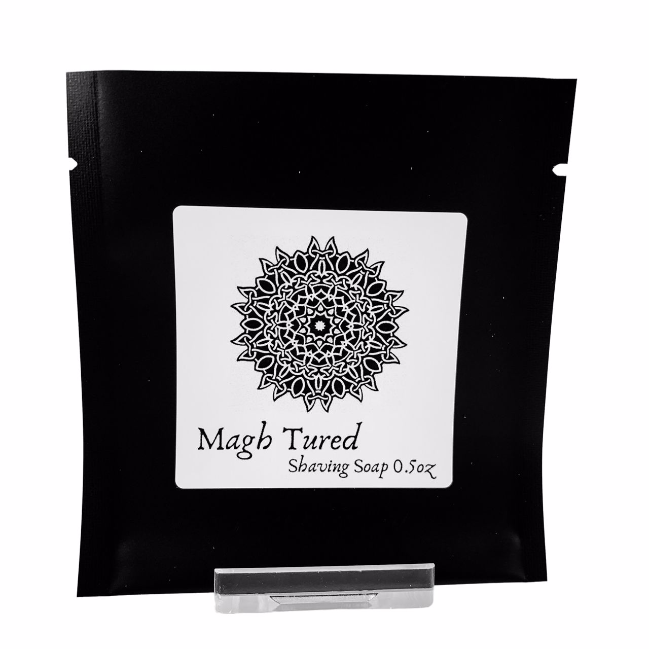 Magh Tured Shaving Soap by Murphy and McNeil, featuring a creamy texture and earthy packaging inspired by Irish mythology.