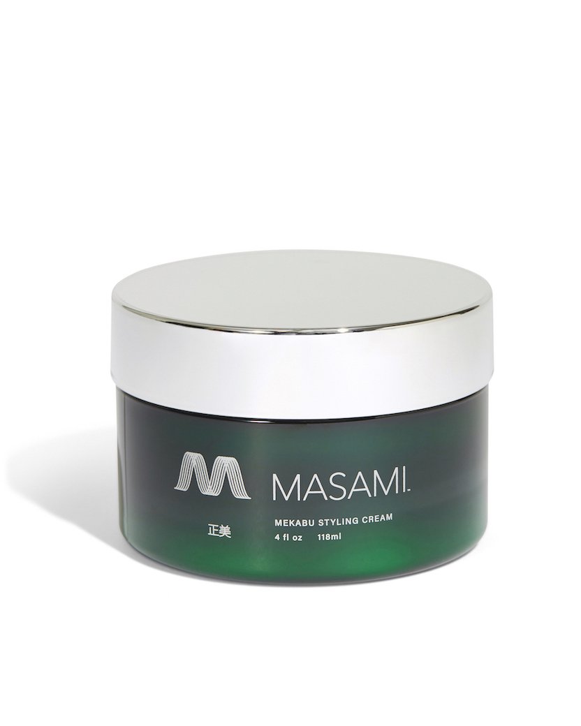 Mekabu Hydrating Styling Cream in a sleek container, showcasing its lightweight texture and hydrating properties.