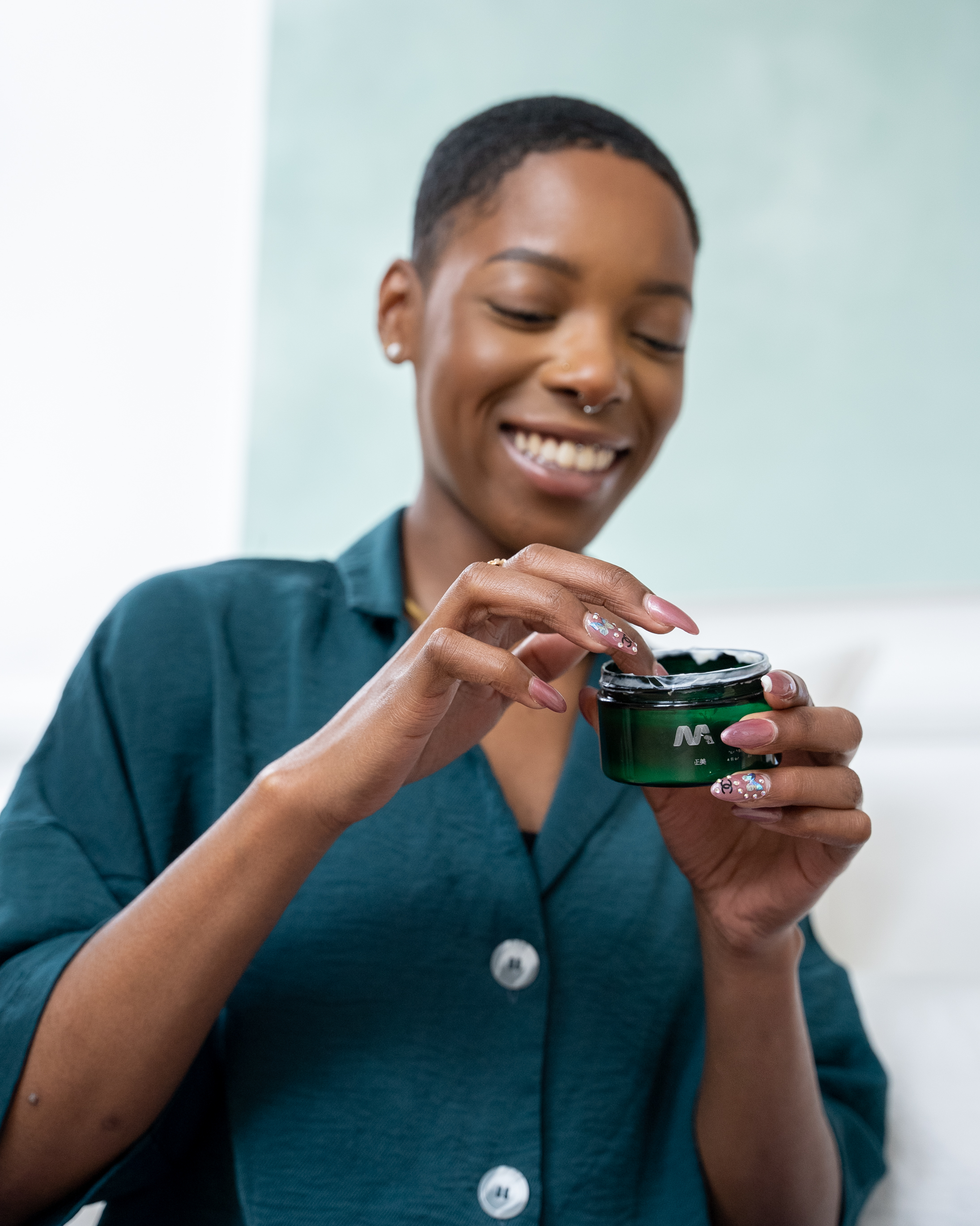 Mekabu Hydrating Styling Cream in a sleek container, showcasing its lightweight texture and hydrating properties.