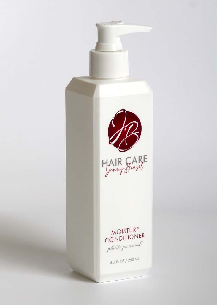 Moisture Conditioner bottle with a sleek design, showcasing its hydrating properties and key ingredients like coconut milk and sunflower seed extract.