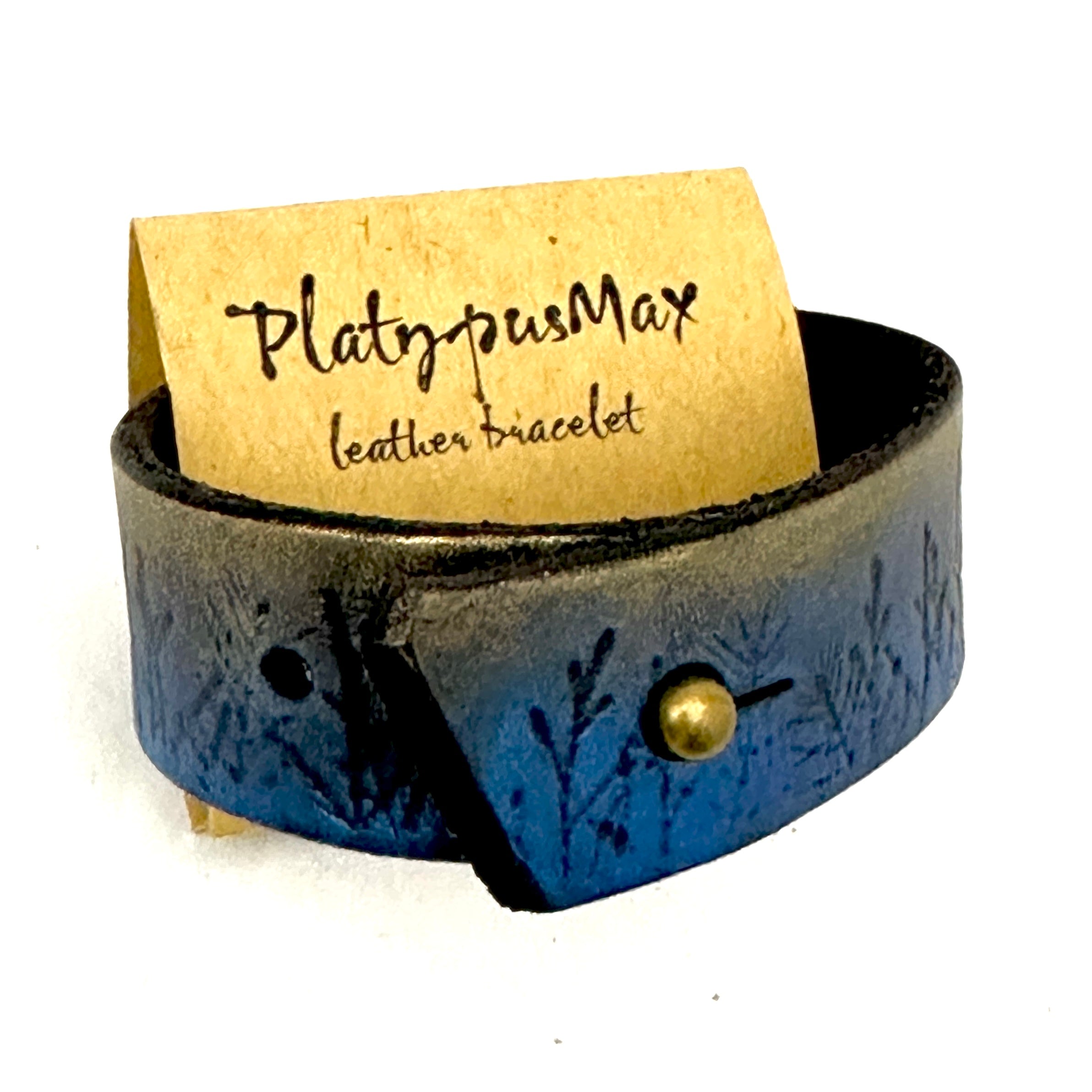 Moonlit Forest Trees Blue & Gold Leather Hair Barrette featuring a unique design inspired by a pine forest at night with shimmering gold accents.