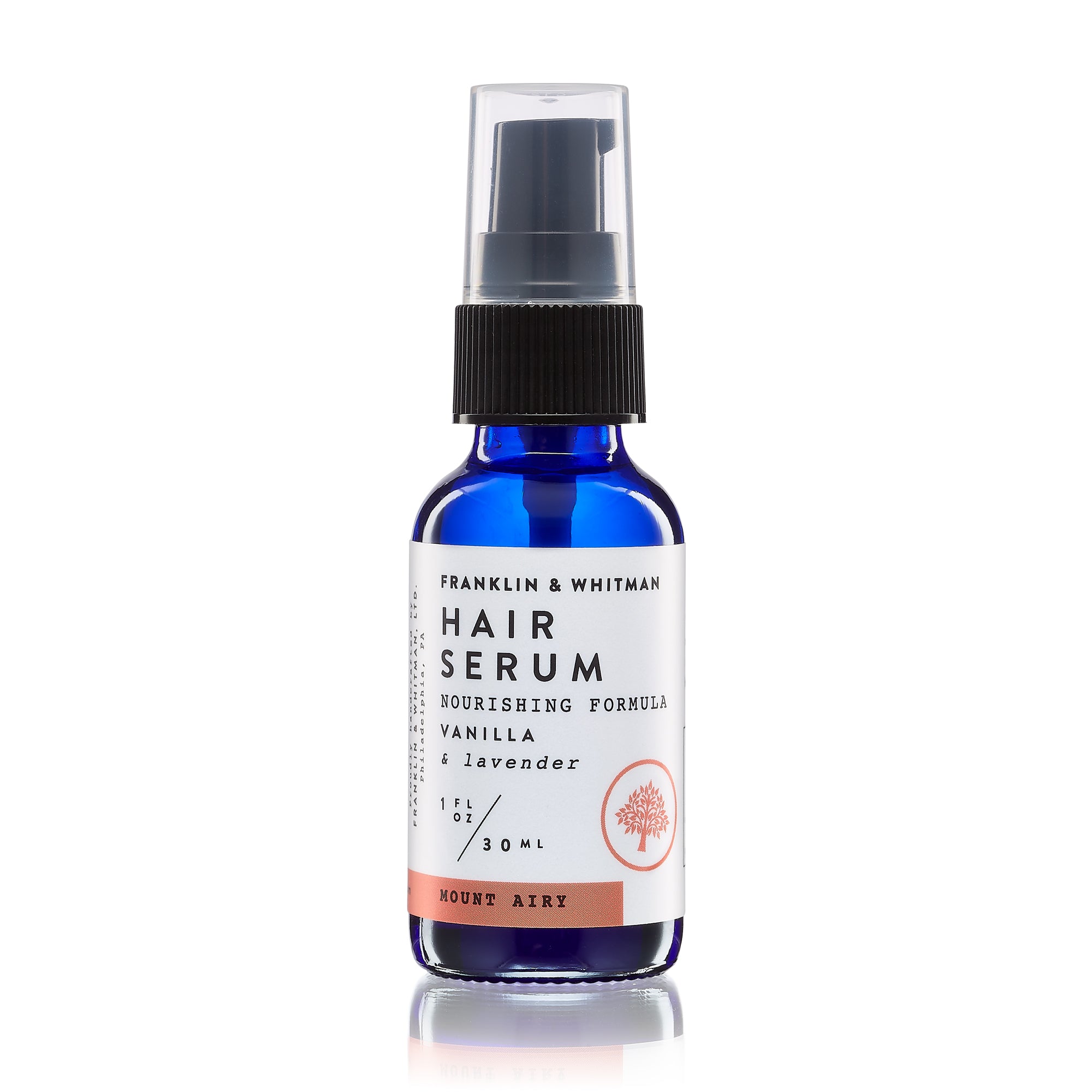 Mount Airy Hair Serum in a 1oz glass bottle with a blend of natural oils for hair nourishment.