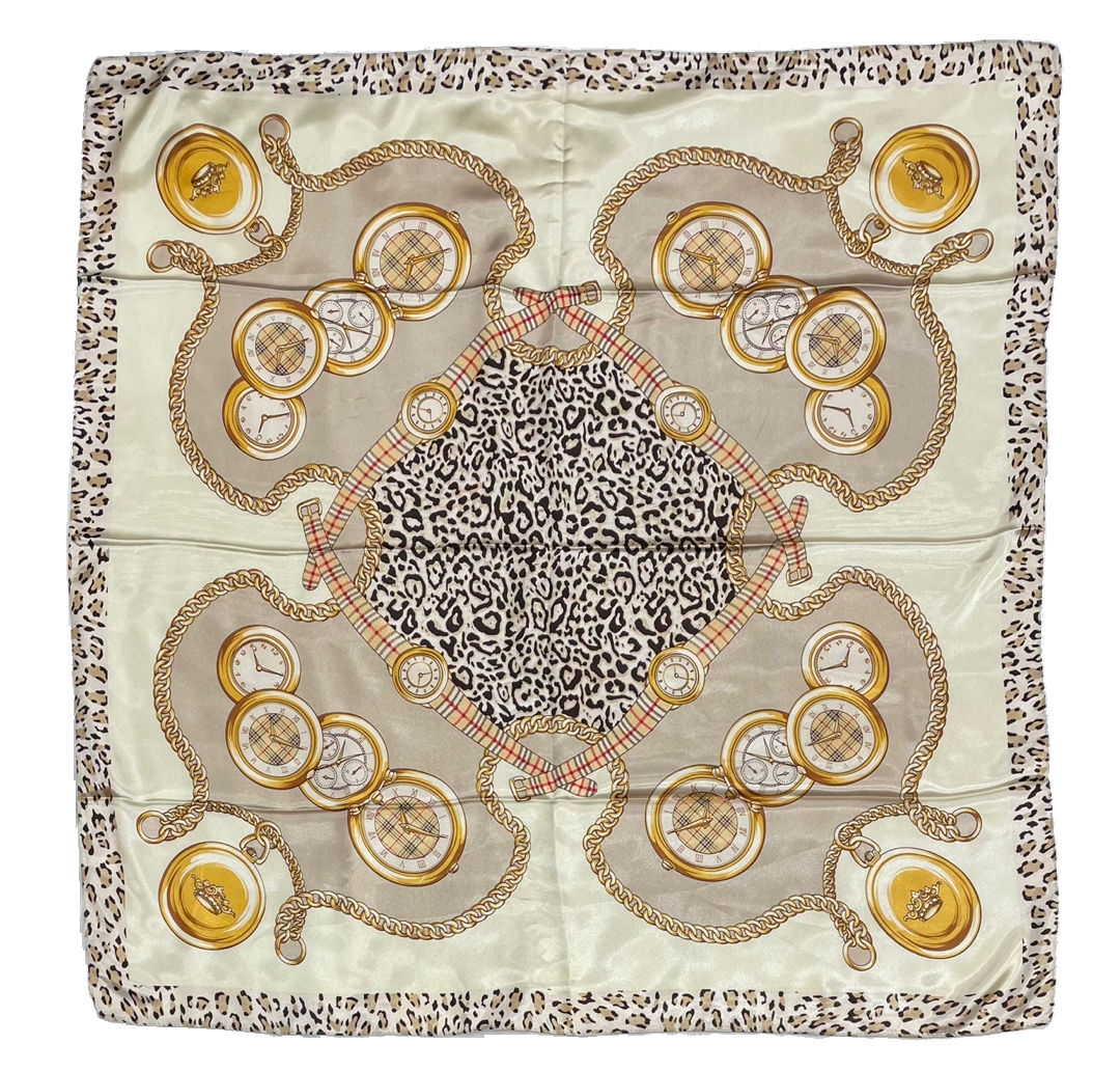 A luxurious 35x35 inch multi-purpose scarf made of soft polyester, showcasing its elegant design and versatility for various styling options.