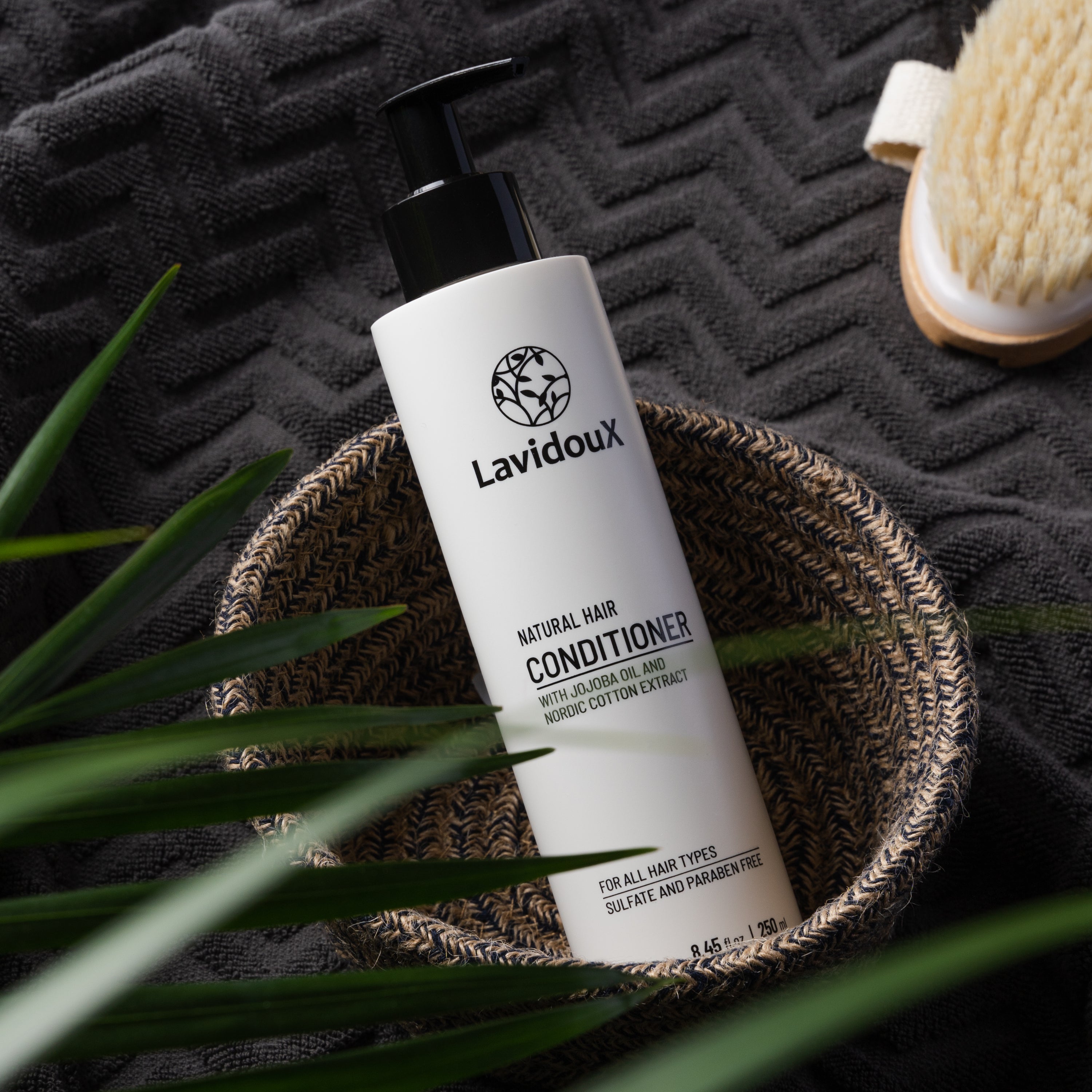 Nordic Cotton Conditioner bottle with natural ingredients, showcasing its gentle formula for all hair types.