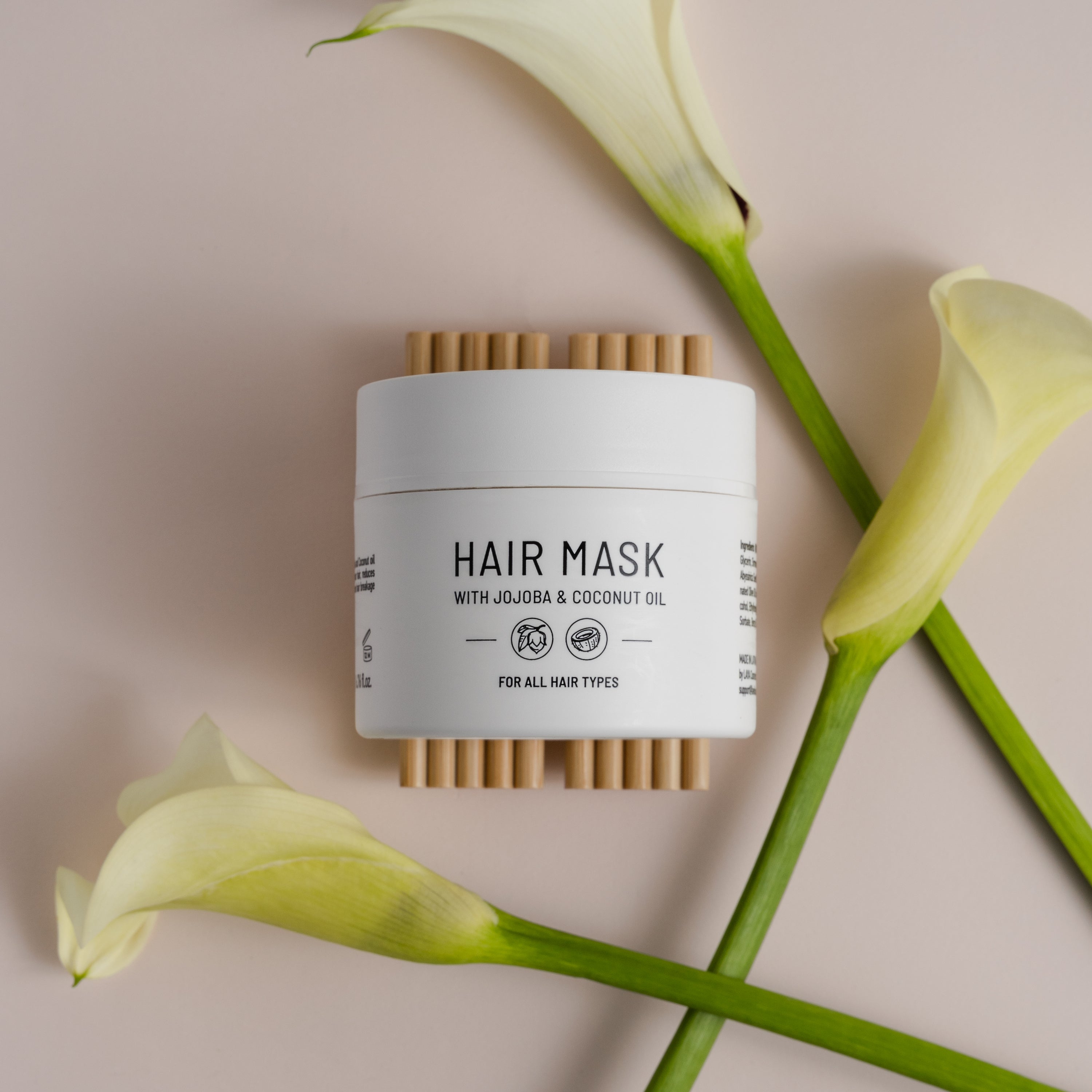 Nordic Cotton Mask in a 200 ml container, featuring natural ingredients like Jojoba and Coconut Oil for hair nourishment.