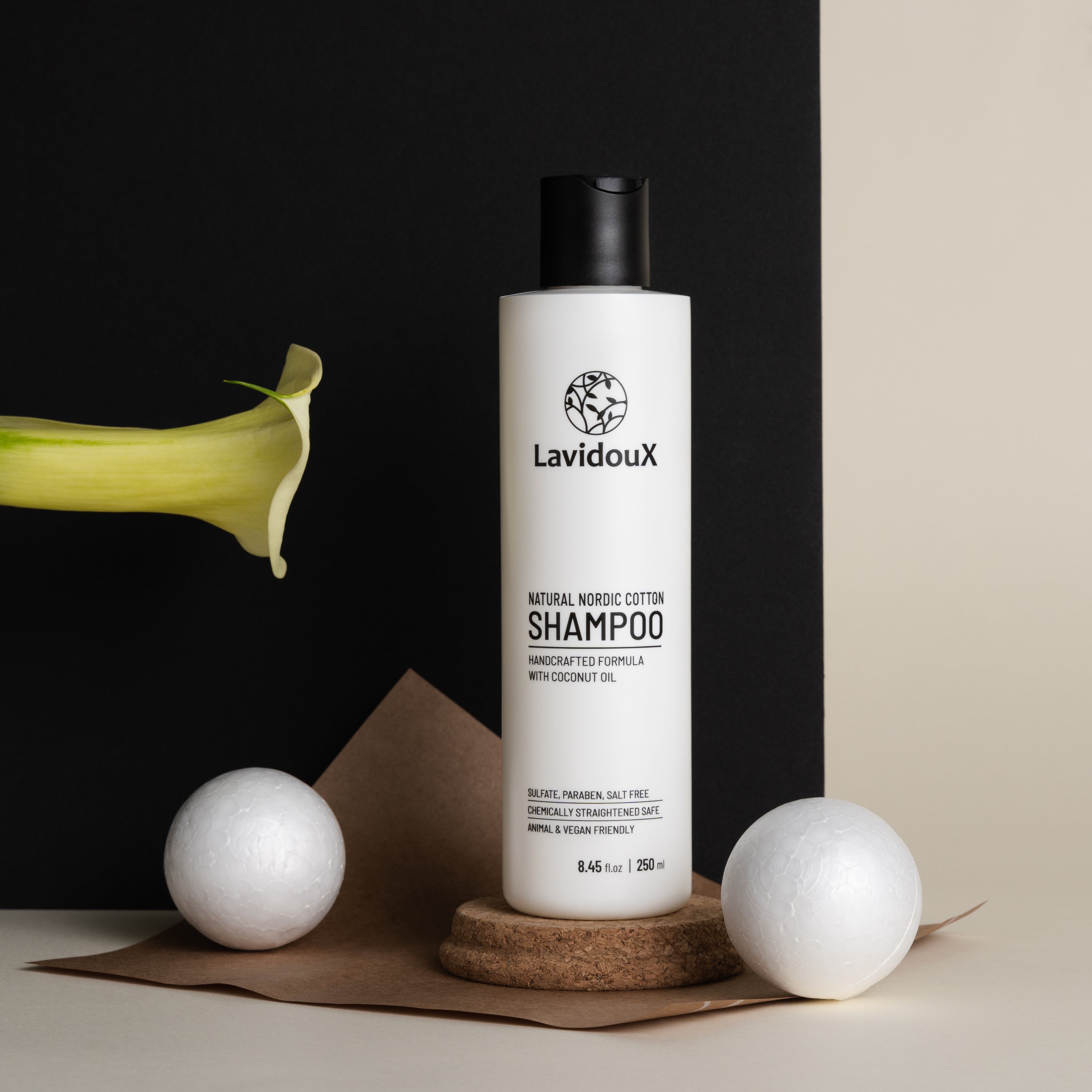 Nordic Cotton Shampoo bottle with natural ingredients, showcasing its gentle formula for all hair types.