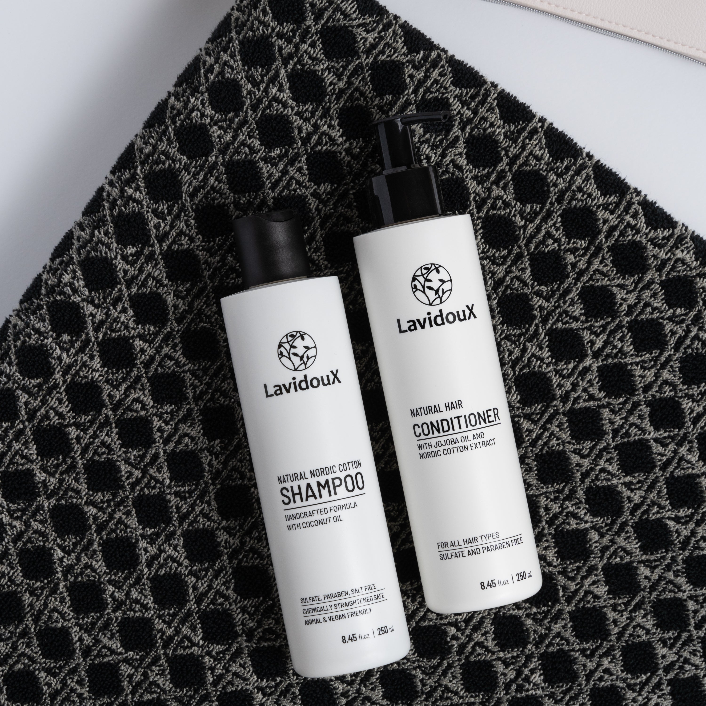 Nordic Cotton Shampoo bottle with natural ingredients, showcasing its gentle formula for all hair types.