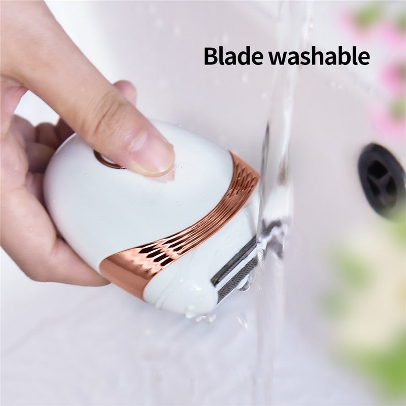 Portable Electric Hair Remover with three blades, designed for painless hair removal on various body parts, shown with USB charging cable.