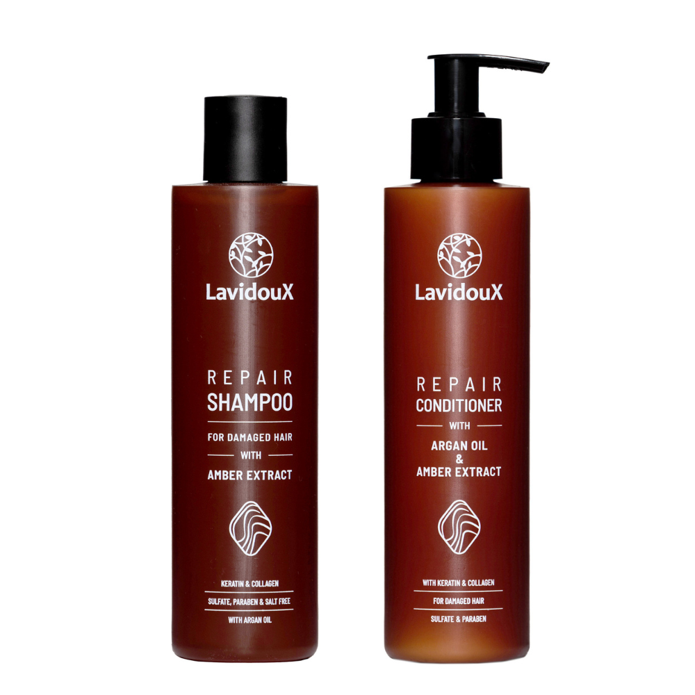 Repair Shampoo and Conditioner Set featuring Amber Extract and Argan Oil in elegant packaging, designed for damaged hair care.