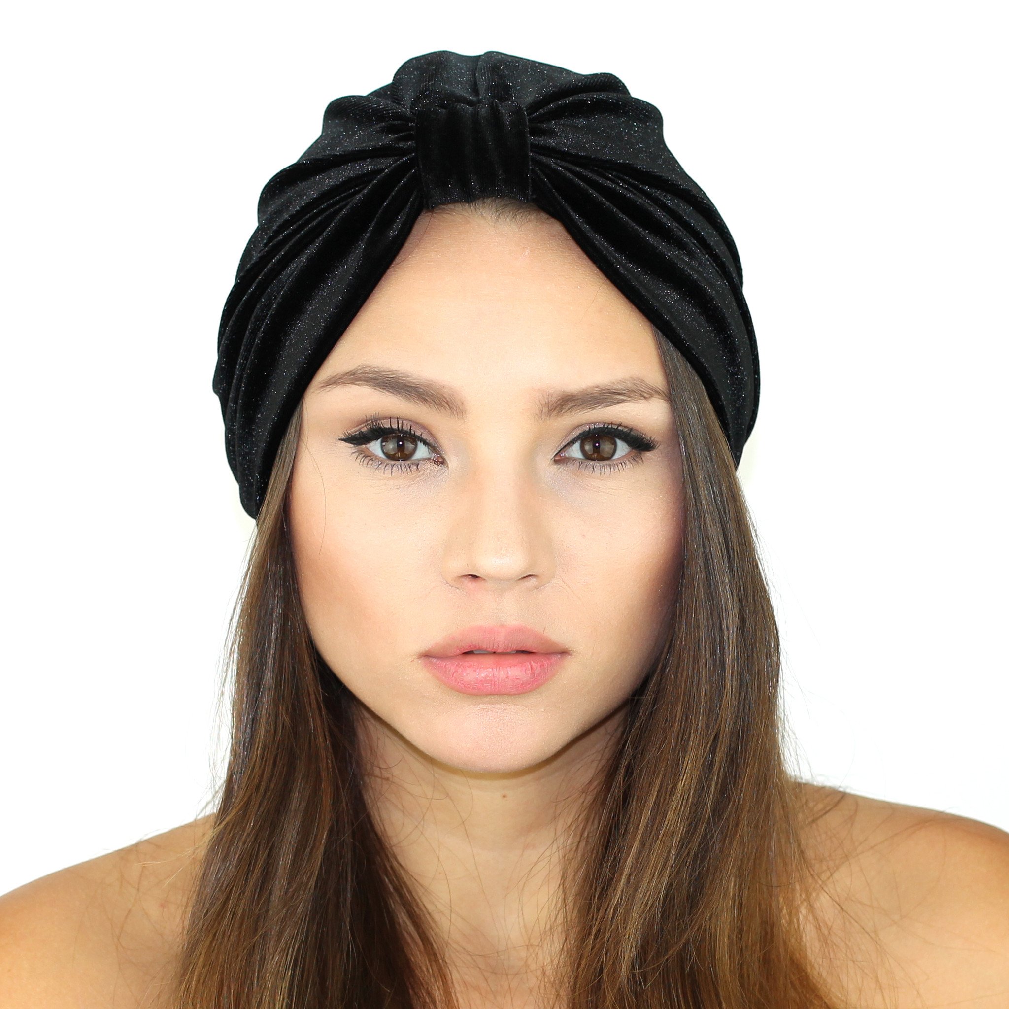 A stylish Stretch Velvet Turban in rich fabric, cinched at the back for a comfortable fit, suitable for various head sizes.