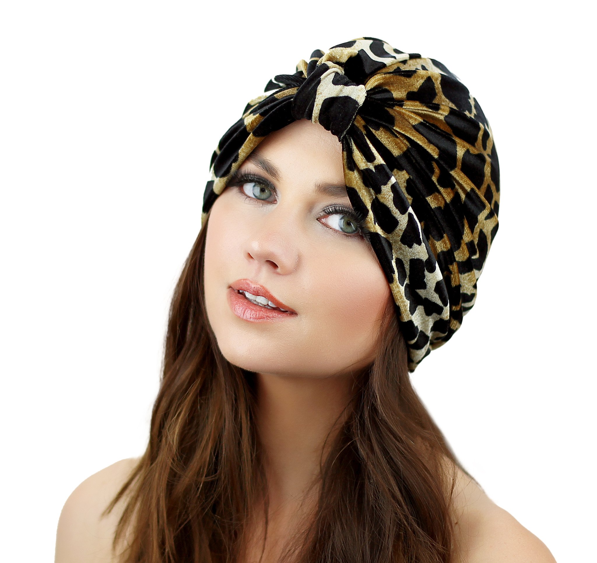 A stylish Stretch Velvet Turban in rich fabric, cinched at the back for a comfortable fit, suitable for various head sizes.