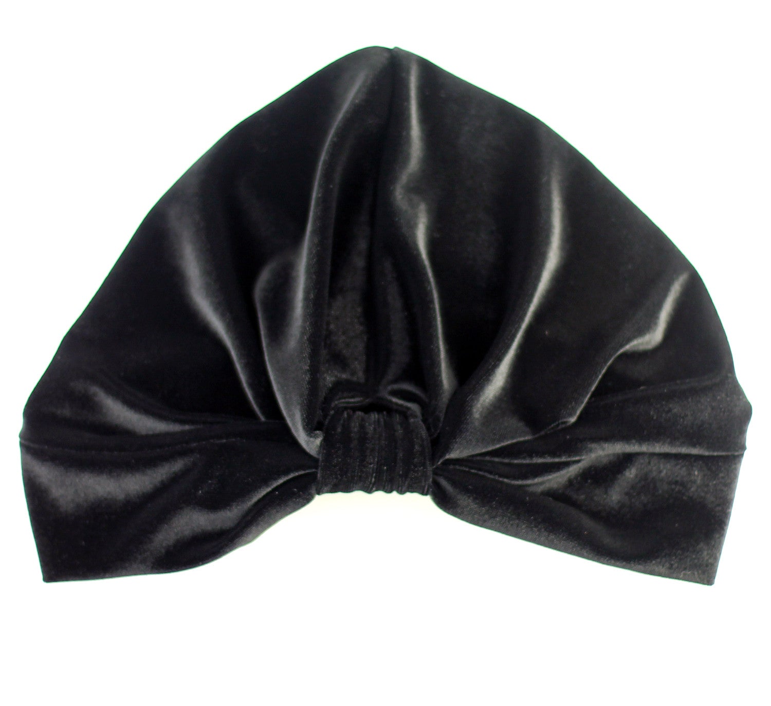 A stylish Stretch Velvet Turban in rich fabric, cinched at the back for a comfortable fit, suitable for various head sizes.