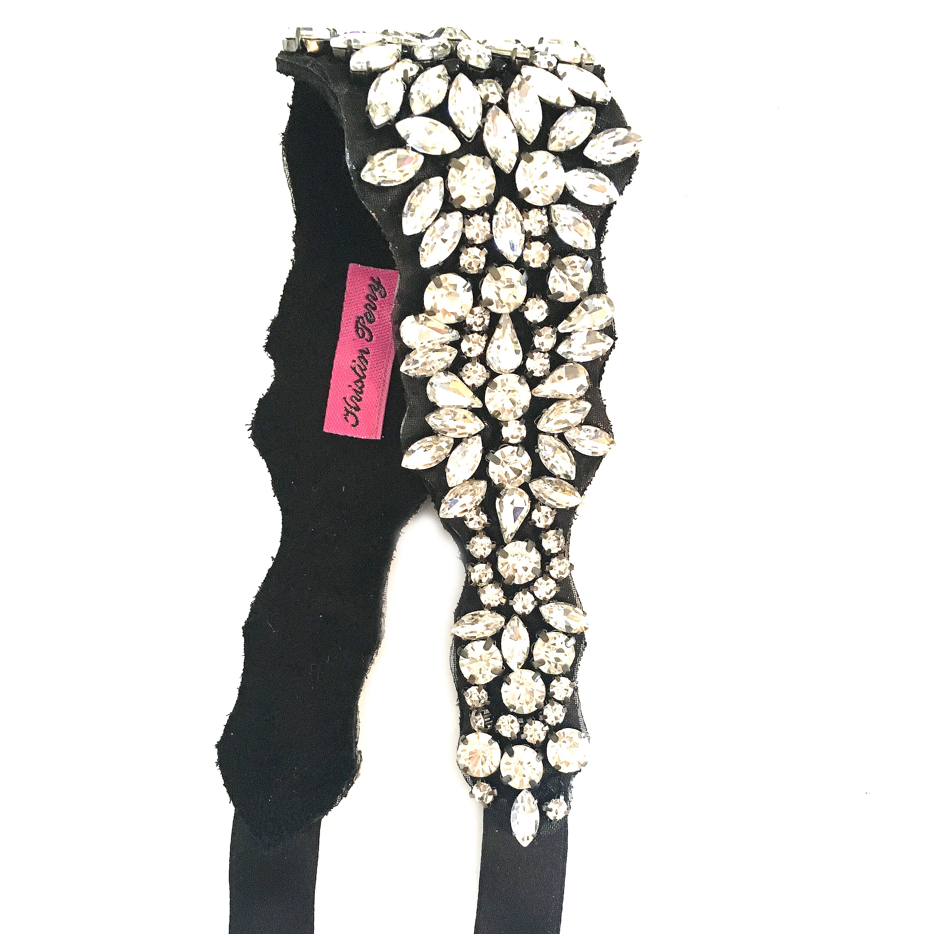 A luxurious suede headband adorned with sparkling glass rhinestones and adjustable silk ties, perfect for elegant occasions.