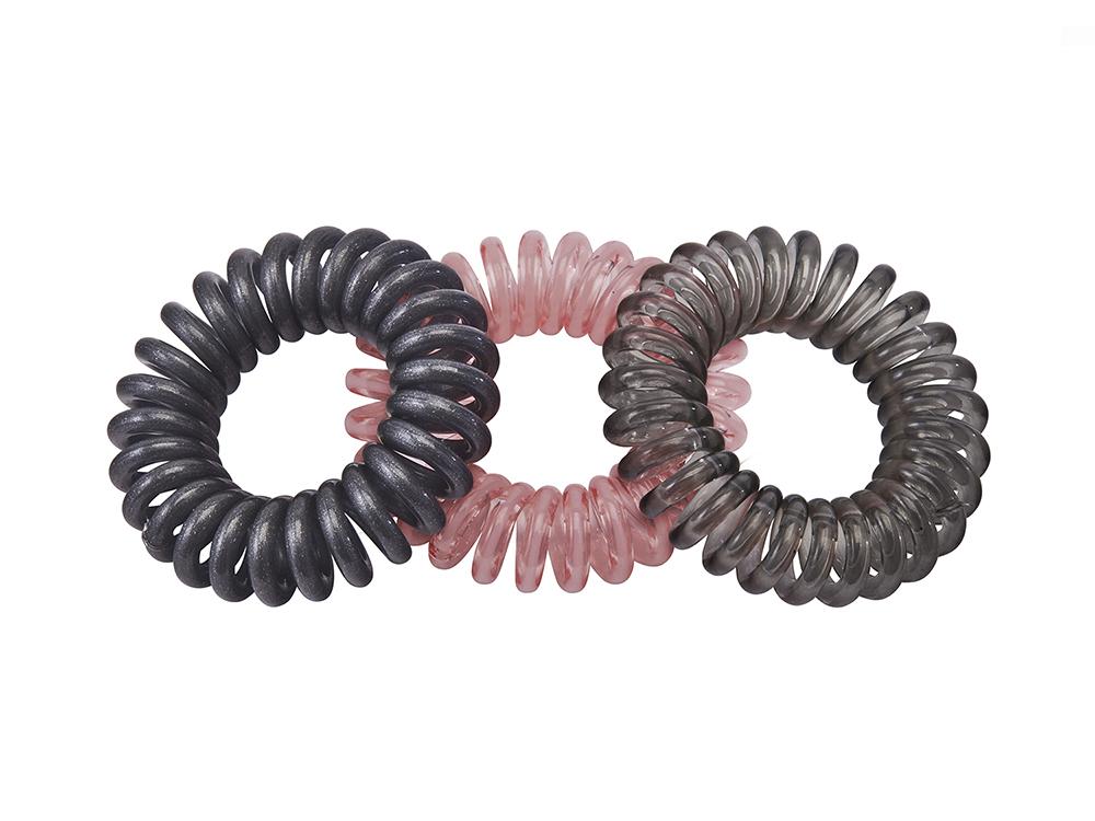 Sugar Twists® coil hair ties in various colors, showcasing their unique spiral design and eco-friendly materials.