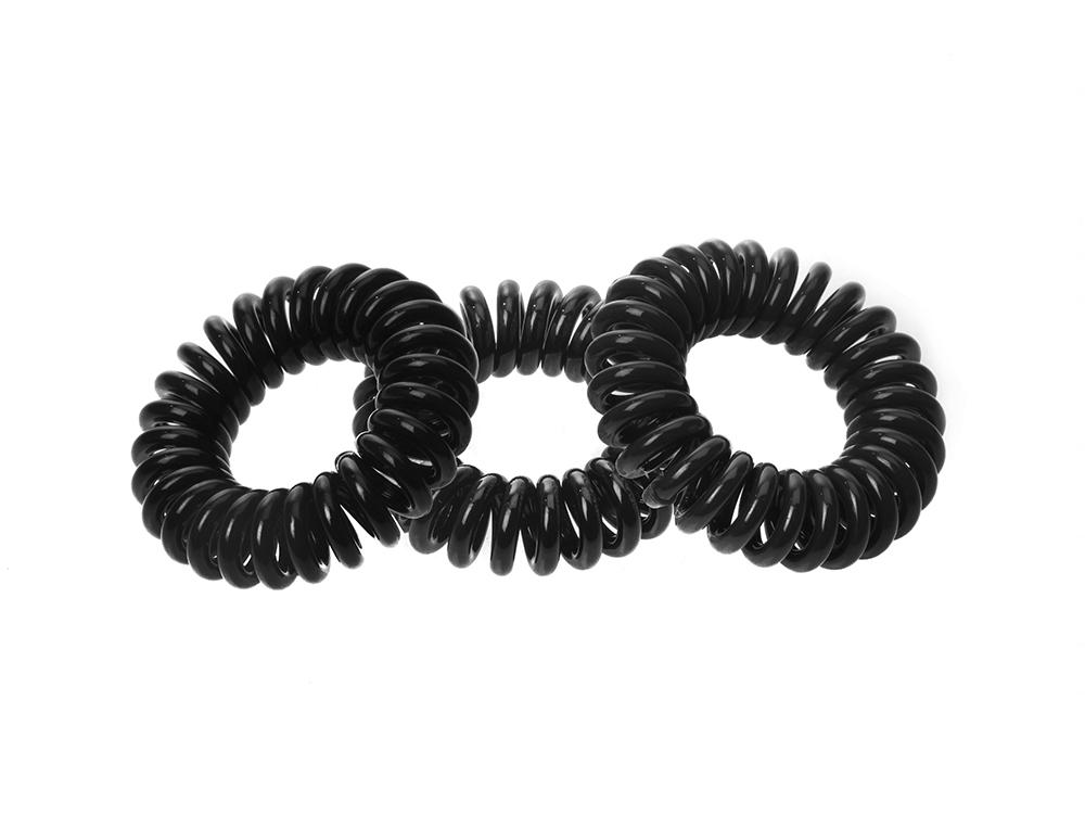 Sugar Twists® coil hair ties in various colors, showcasing their unique spiral design and eco-friendly materials.