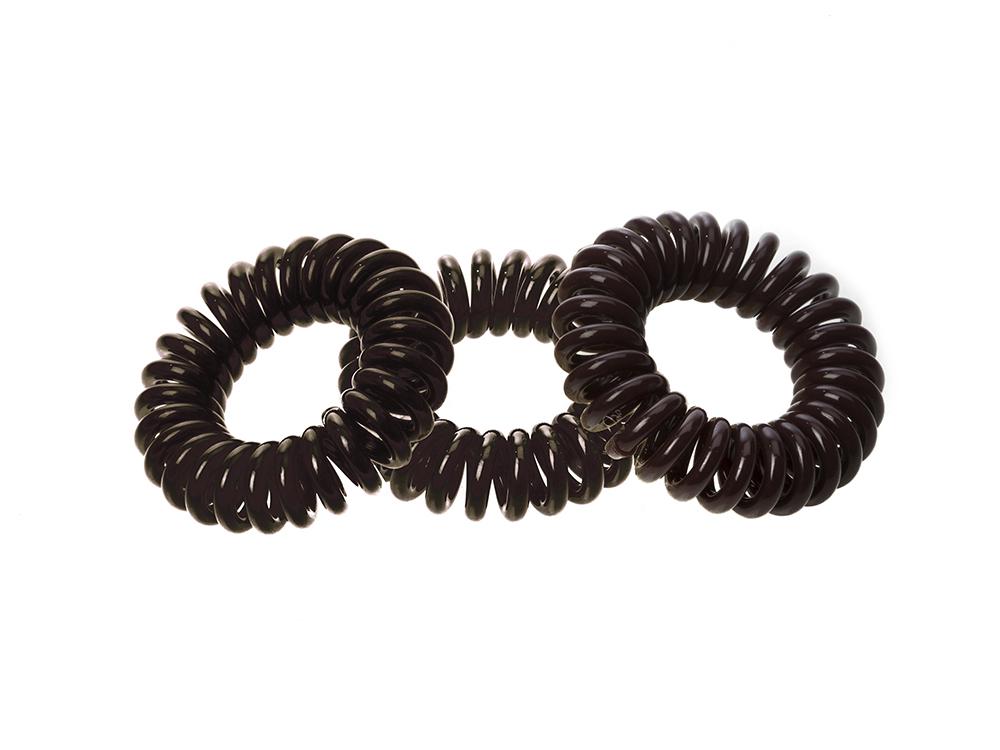 Sugar Twists® coil hair ties in various colors, showcasing their unique spiral design and eco-friendly materials.