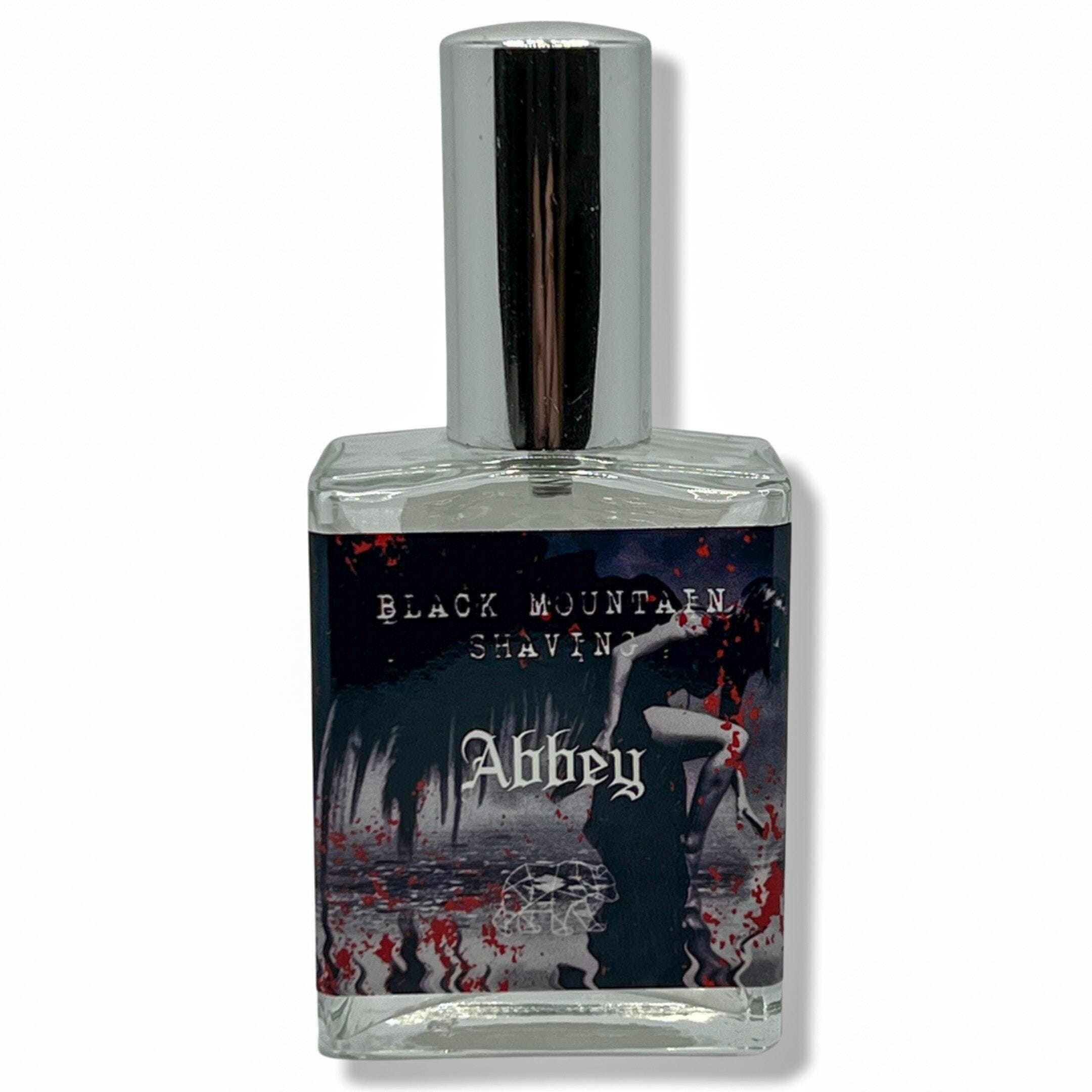 The Abbey Eau de Parfum bottle by Murphy and McNeil, featuring a sleek design with a dark amber hue, symbolizing warmth and nature.