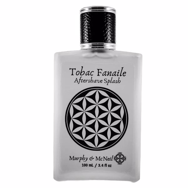 Tobac Fanaile Aftershave Splash by Murphy and McNeil in a sleek bottle, showcasing its rich amber liquid and elegant label design.