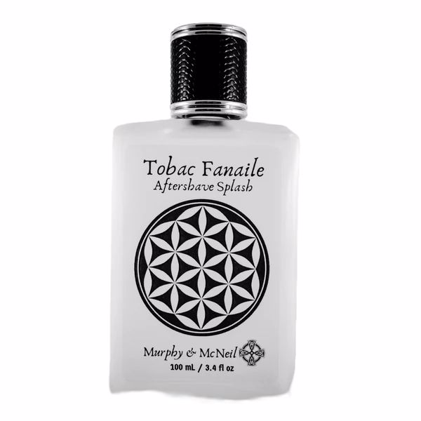 Tobac Fanaile Aftershave Splash by Murphy and McNeil in a sleek bottle, showcasing its rich amber liquid and elegant label design.