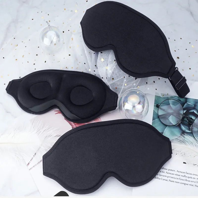 3D Portable Soft Eye Mask in black, designed for comfortable sleep, featuring an ergonomic shape and adjustable strap.