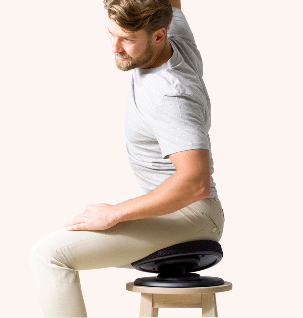 Balance Ergonomic Seat on a chair, featuring a cushioned, unstable surface designed for active sitting and muscle activation.