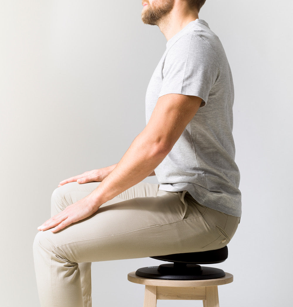 Balance Ergonomic Seat on a chair, featuring a cushioned, unstable surface designed for active sitting and muscle activation.