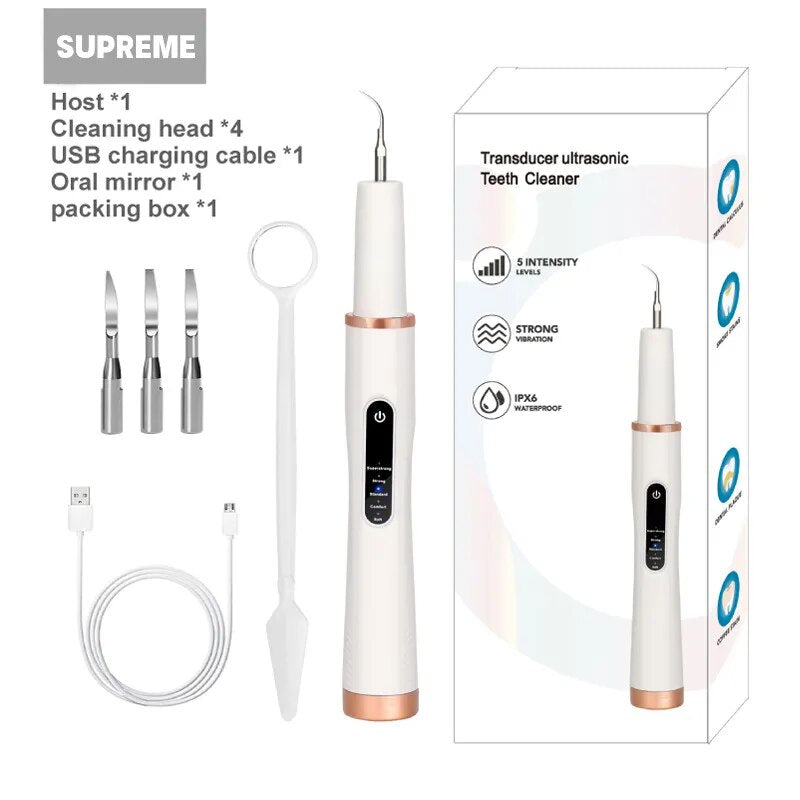 Ultrasonic Tooth Cleaner with stainless steel tips and USB charging cable, designed for effective dental care and stone removal.