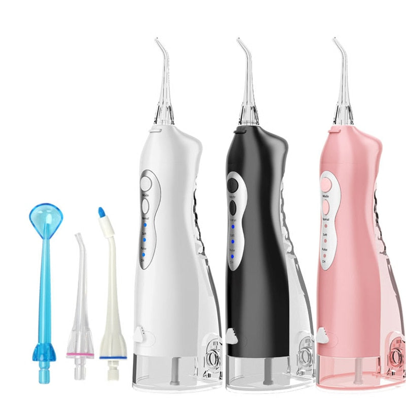 Rechargeable portable dental water jet oral irrigator with multiple nozzles and USB charging cable.