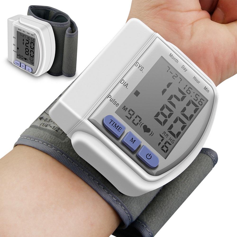 Digital Wrist Blood Pressure Monitor with LCD display, measuring arterial pressure and pulse rate, designed for home and portable use.