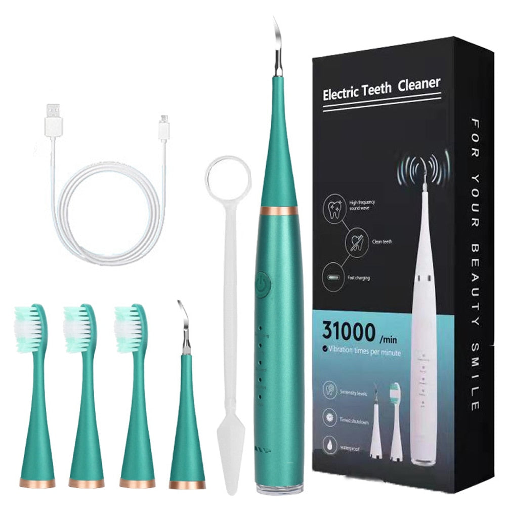 Electric Dental Calculus Remover with multiple accessories including toothbrush heads and USB charging cable, designed for effective teeth cleaning.