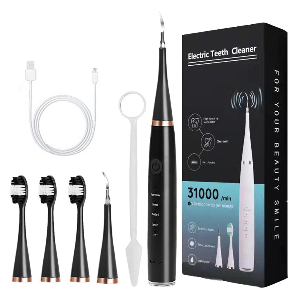 Electric Dental Calculus Remover with multiple accessories including toothbrush heads and USB charging cable, designed for effective teeth cleaning.