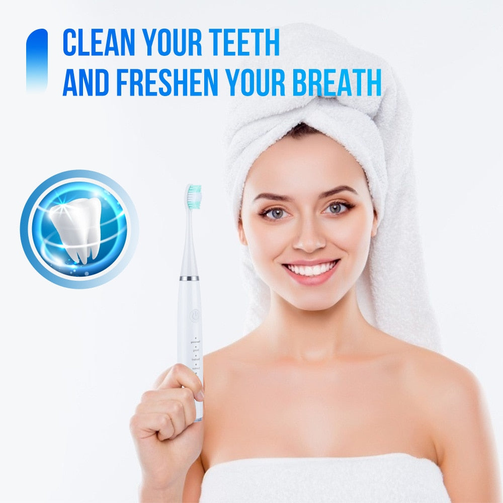 Electric Dental Calculus Remover with multiple accessories including toothbrush heads and USB charging cable, designed for effective teeth cleaning.