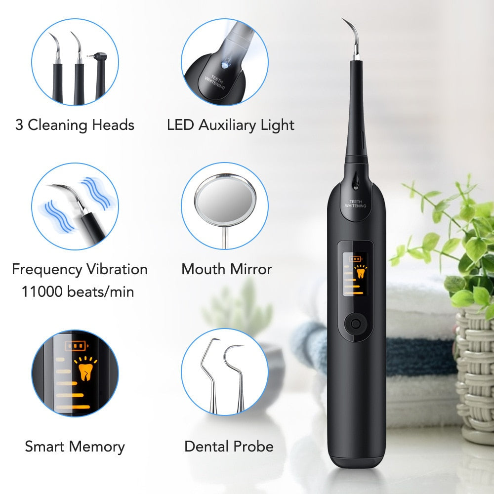 Electric Dental Calculus Remover with LED display and various cleaning tips, showcasing its sleek design and functionality.