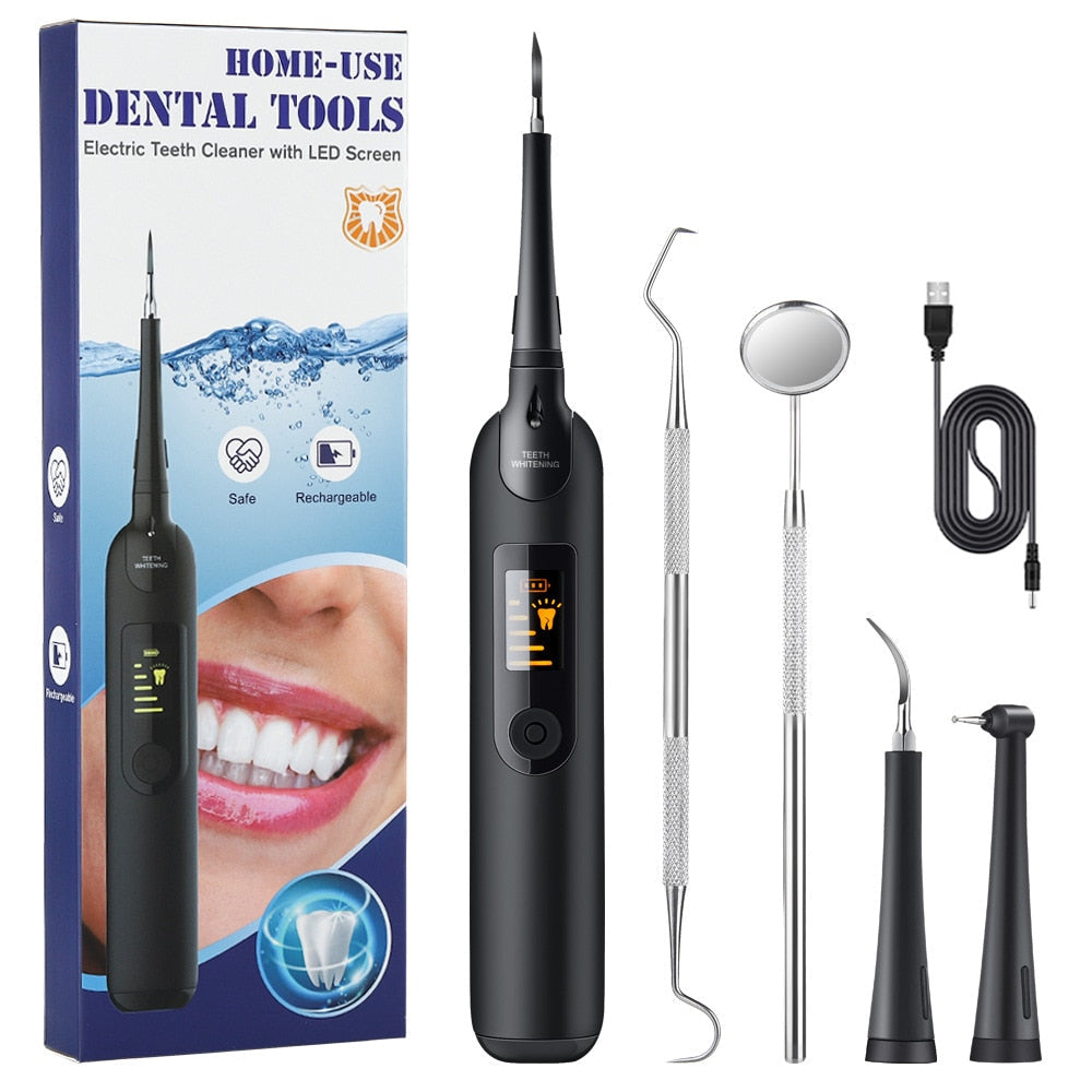 Electric Dental Calculus Remover with LED display and various cleaning tips, showcasing its sleek design and functionality.