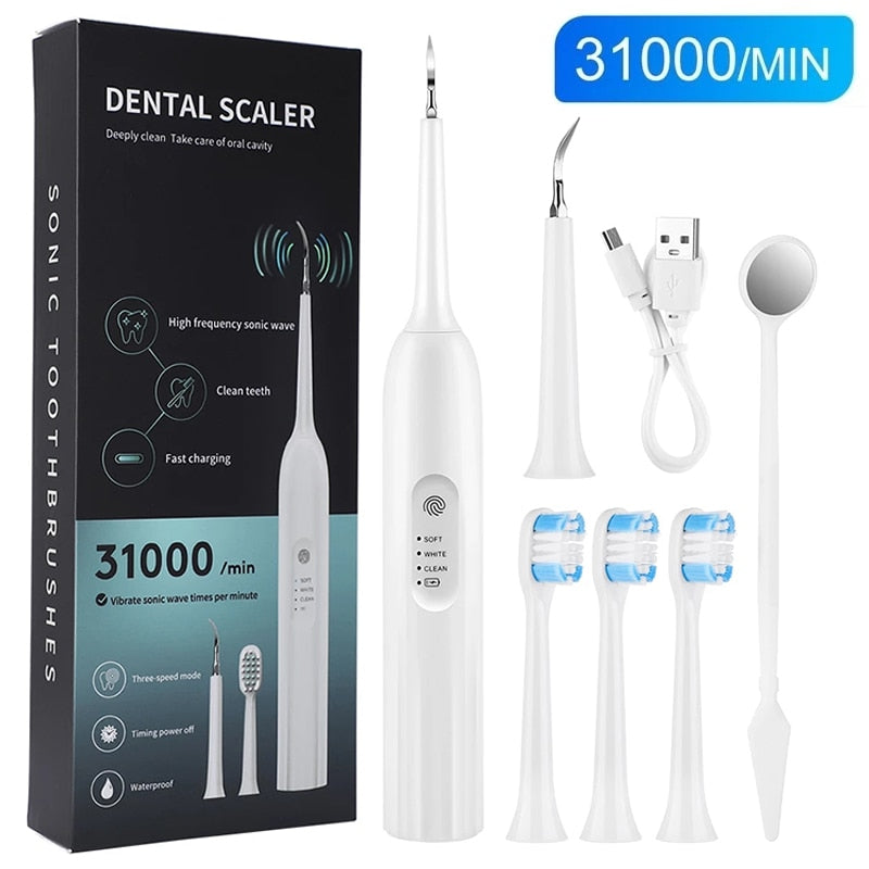 Electric Ultrasonic Tooth Cleaner with multiple attachments including toothbrush heads and dental scaler, designed for effective tartar removal.