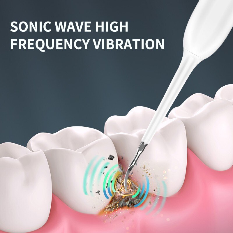 Electric Ultrasonic Tooth Cleaner with multiple attachments including toothbrush heads and dental scaler, designed for effective tartar removal.