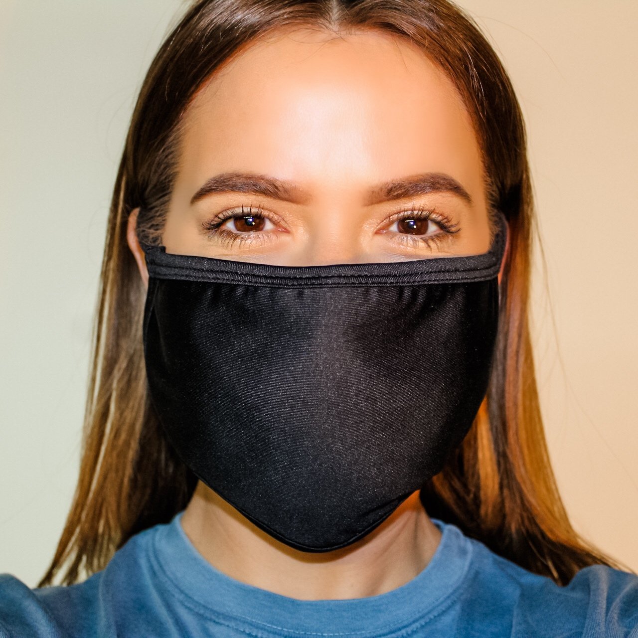 Flat Ear Loop Face Mask in black, made from 100% cotton, featuring a double-lined structure for durability and comfort.