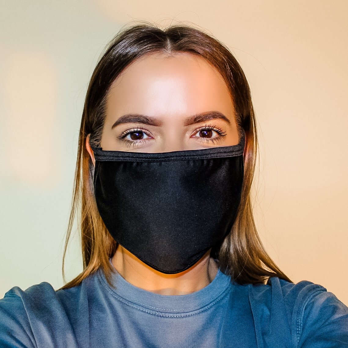 Flat Ear Loop Face Mask in black, made from 100% cotton, featuring a double-lined structure for durability and comfort.