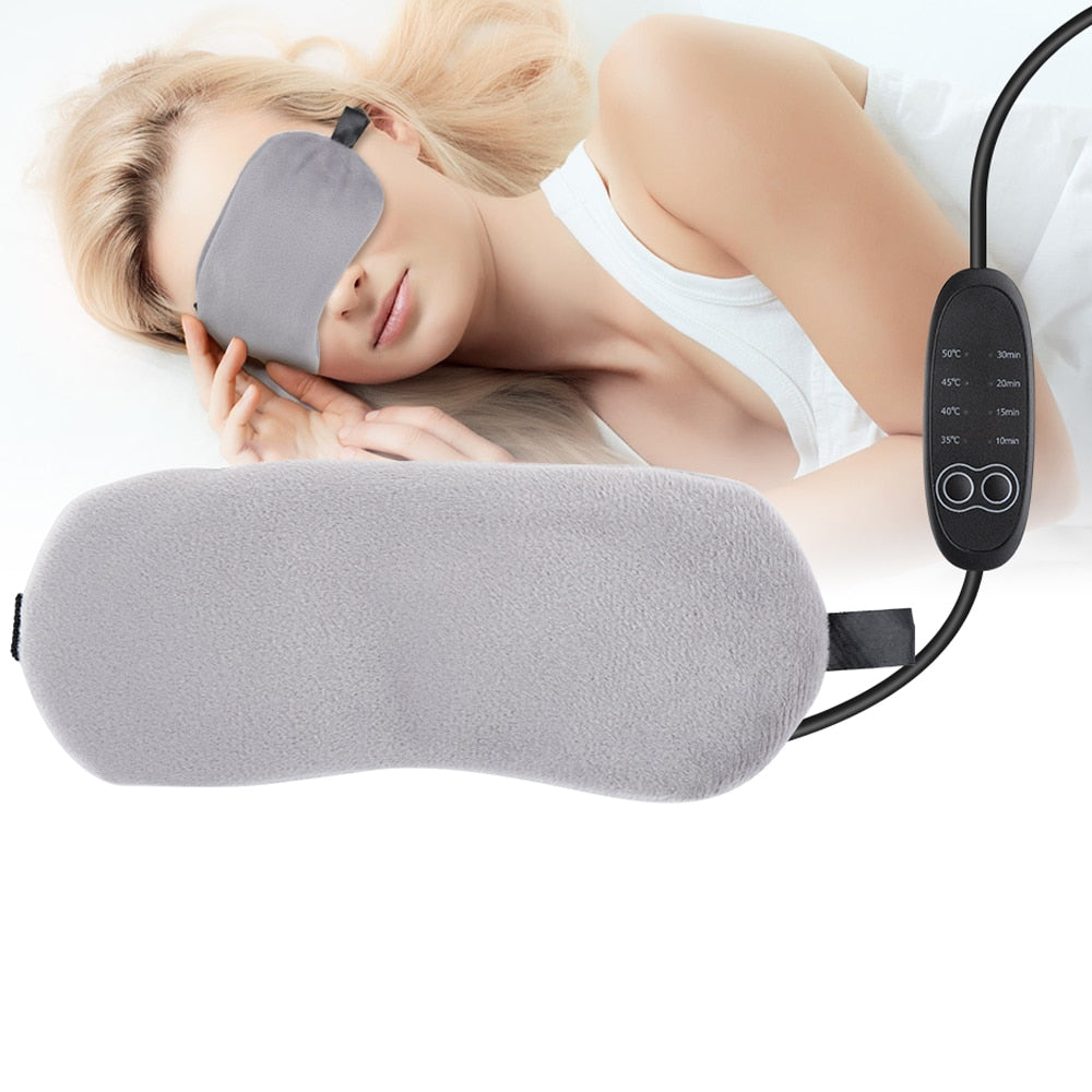 Heated Eye Mask in gray color, featuring a soft cotton exterior and a lavender stuffing bag for aroma therapy.