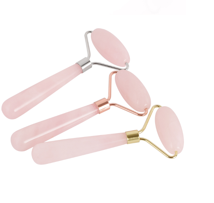 High Quality Women's Roller Massage Tool made of rose quartz, designed for facial and body massage, promoting relaxation and skin health.