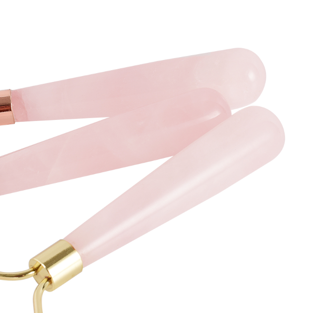 High Quality Women's Roller Massage Tool made of rose quartz, designed for facial and body massage, promoting relaxation and skin health.