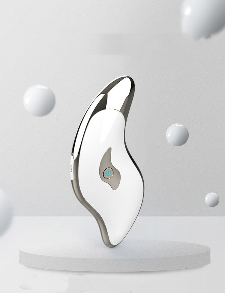 Household Facial Heating and Face-lifting Device in white color with a scraping board, designed for home skincare.