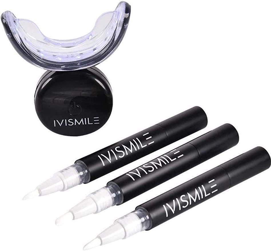 INVISMILE Teeth Whitening Device featuring a wireless dual light LED activation light and whitening gel syringes for effective teeth whitening.