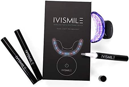 INVISMILE Teeth Whitening Device featuring a wireless dual light LED activation light and whitening gel syringes for effective teeth whitening.