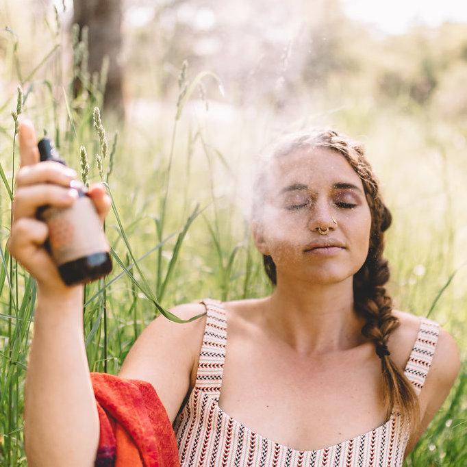 Kapha Spritzer bottle with a botanical blend, featuring essential oils of Bergamot, Juniper Berry, Grapefruit, and Sage, designed for uplifting energy.