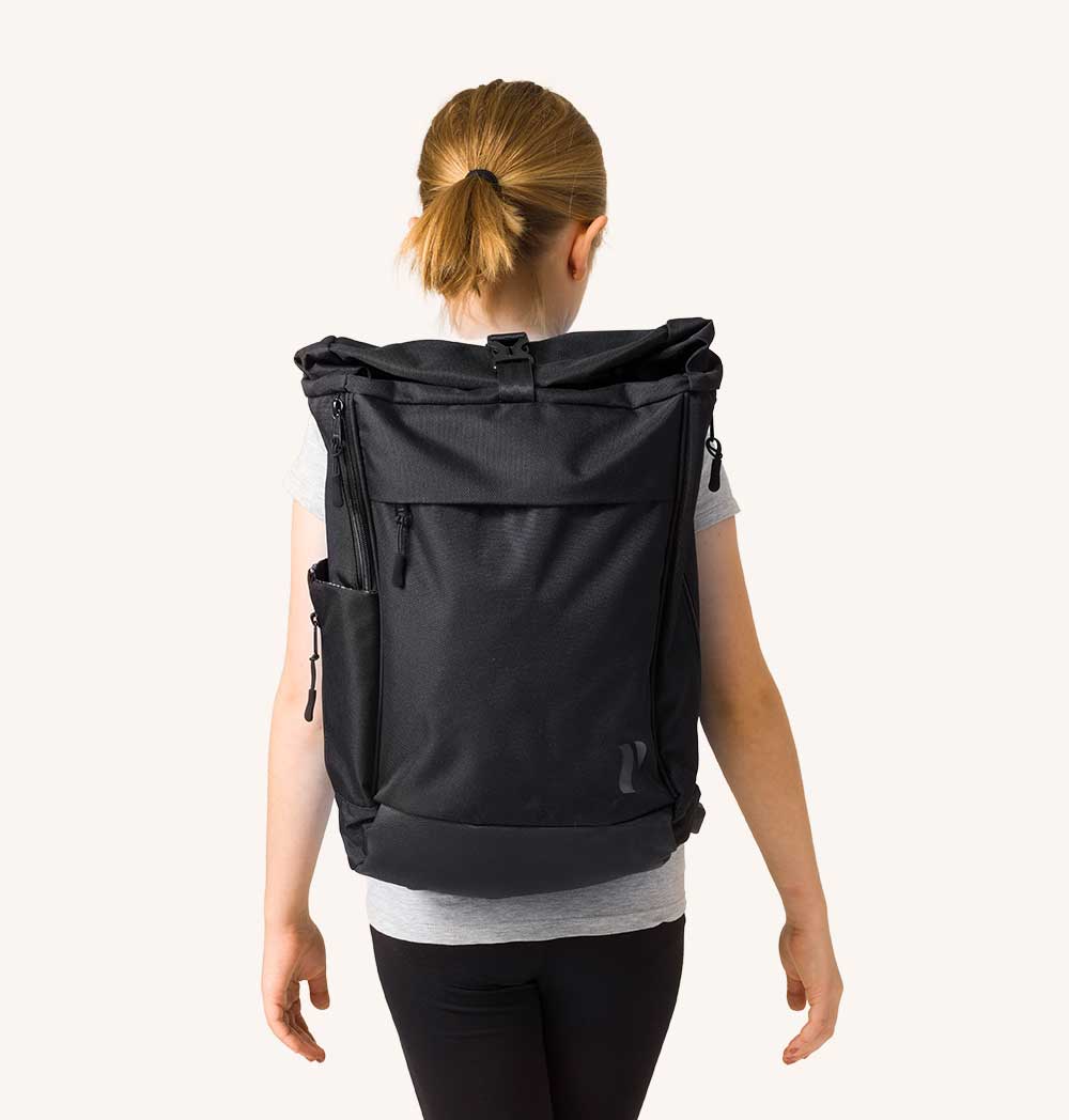 Kids Vertical Ergonomic Backpack featuring a unique design for posture support, made from durable water-repellent material.