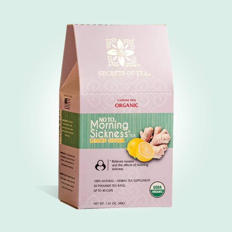 A box of Lemon Ginger Herbal Tea Blend featuring organic ingredients, perfect for soothing morning sickness.