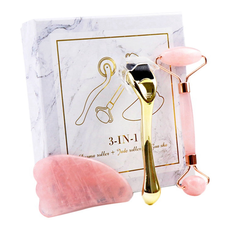 Micro-needle Powder Crystal Roller Jade Massager set including a pink roller, claw scraping board, and micro needle in an elegant gift box.